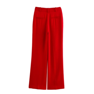 Detailed back view of red high-waist wide-leg trousers with elegant welt pockets