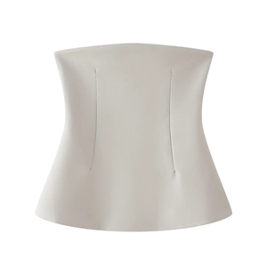 Detailed view of white Y2K off-shoulder corset top with structured seams and slim fit