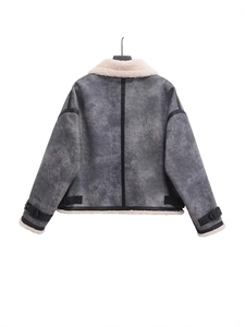 Grey faux shearling jacket with cream wool trim and back strap detail in street style
