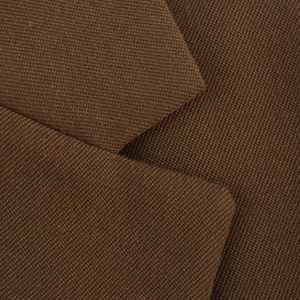 Close-up of brown casual blazer showing high-quality twill wool fabric texture and weave