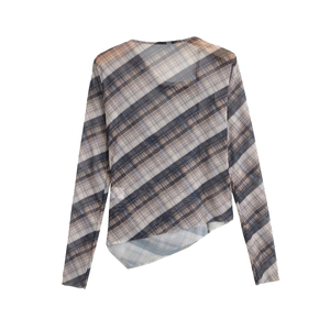 Detail of taupe plaid mesh top with translucent texture and irregular hemline