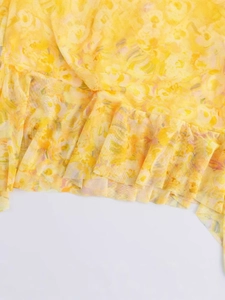 Yellow mesh sleeveless mini dress with floral print and ruffle details for summer