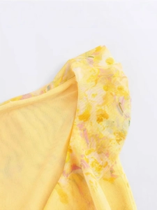 Yellow mesh sleeveless mini dress with floral print and ruffle details for summer