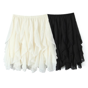 Detail of layered chiffon ruffles with delicate lace trim on elastic waist skirt