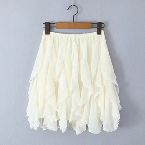 Detailed view of layered irregular chiffon skirt with lace trim and elastic waist