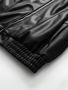 Short black PU leather jacket with bow design and elastic waist hem for women
