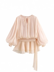 Elegant peach long sleeve ruffled mini dress with bubble sleeves and cinched waist design