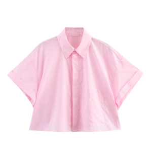 Flat lay of pink short-sleeved shirt featuring drop shoulders and a large chest pocket