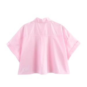 Back view of a baby pink cropped short-sleeve shirt with a box pleat and yoke seam
