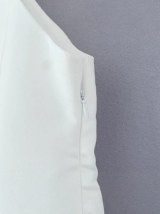 Short white fit-and-flare dress with square neck and side invisible zipper detail