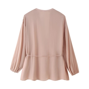 Back view of a mauve long-sleeve blouse featuring a drawstring waist and pleated hem