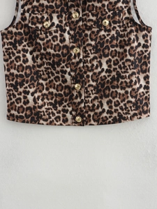 Women's leopard print vest featuring gold lion buttons and functional chest pockets
