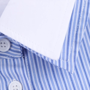 Close-up of blue and white striped shirt with white contrast collar and resin buttons