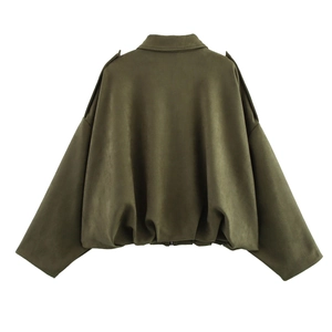 Detail of army green suede bomber jacket with batwing sleeves and shoulder epaulettes