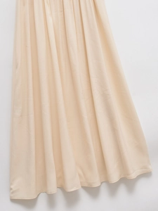 Champagne satin maxi dress with U-neck, elastic waist and vertical pleated texture