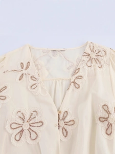 Spring women's v-neck dress with floral embroidery, waist tie, and elegant long sleeves