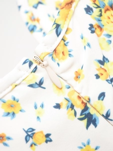 Detail of floral print fabric with a seamless invisible zipper on a summer dress