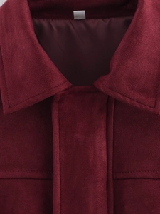 Macro detail of wine red suede jacket with smooth satin lining and precise collar stitching