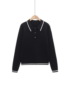 Women's long sleeve black knit polo shirt with white contrast stripes and gold buttons