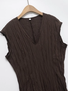 Brown sleeveless pleated V-neck dress for women made of elegant textured fabric