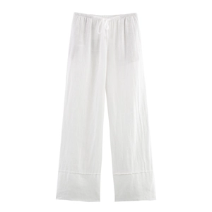 Vue détaillée du pantalon en lin blanc à jambes larges avec taille élastique à cordon réglable