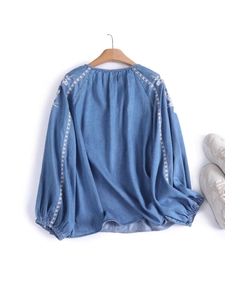 Vintage light blue denim shirt for women with white floral embroidery and lantern sleeves