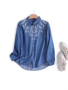 Vintage denim long sleeve shirt with white floral embroidery and button closure
