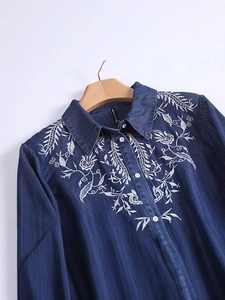 Retro dark blue denim shirt for women with detailed white floral embroidery and classic collar