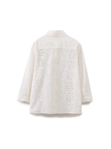 White long sleeve shirt featuring intricate broderie anglaise embroidery from the back