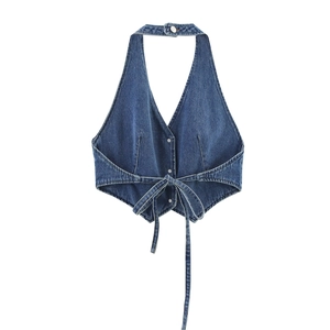 Denim blue halter top with deep V-neck and lace-up hem detail on white background