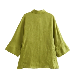 Back view of a loose-fit olive green linen shirt featuring drop shoulders and classic collar