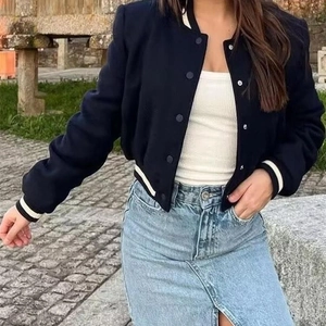 Women's slim fit navy blue short bomber jacket with striped ribbing and Y2K aesthetic
