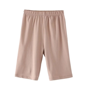 Detail of dusty pink elastic waistband shorts in soft stretch fabric with fine stitching