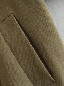 Detail of twill weave fabric and precise stitching on cargo jacket pocket