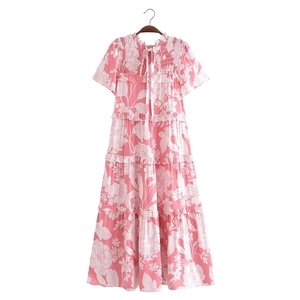 Pink and white floral tiered maxi dress with pleated round neck and ruffled hem