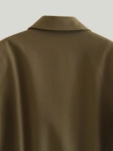 Detail view of the deep olive green twill collar and back of this chic cargo jacket