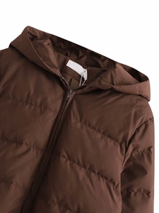 Detailed view of dark brown padded puffer jacket with hood and smooth front zipper