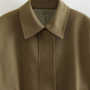 Women's minimalist khaki cargo jacket with classic lapel collar and Y2K aesthetic style