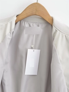 Close-up of the ribbed stand-up collar and smooth lining of this Y2K aviator jacket