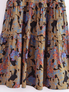 Detailed view of the layered floral ruffle design on this summer rayon tiered dress