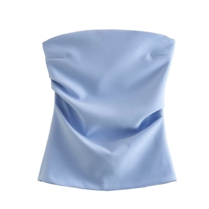 Close-up of light blue strapless tube top featuring horizontal pleats and textured fabric