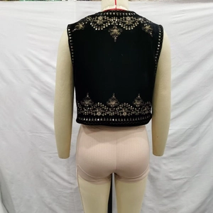 Y2K velvet vest featuring intricate gold embroidery and sequins on the back view
