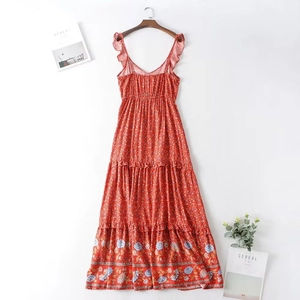 Red floral bohemian maxi dress with ruffle straps and tiered skirt for summer