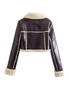 Back view of a cropped dark brown faux leather jacket with cream fleece trim details