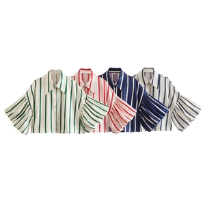 Detail of colorful striped Y2K bubble sleeve shirts with turn-down collar and size label