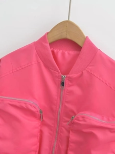 Hot pink Y2K bomber jacket featuring silver metal zippers and ribbed baseball collar detail