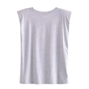 Detail of light gray muscle tee showing padded shoulders and soft cotton texture