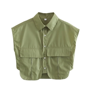 Detail view of olive green Y2K sleeveless cargo shirt with large pockets and lapel collar