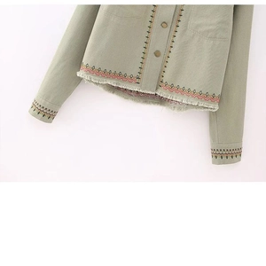 Sage green short cotton jacket with colorful embroidery and fringe trim accents
