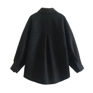 Rear view of black wool-blend shacket showing lapel collar and center back pleat detail